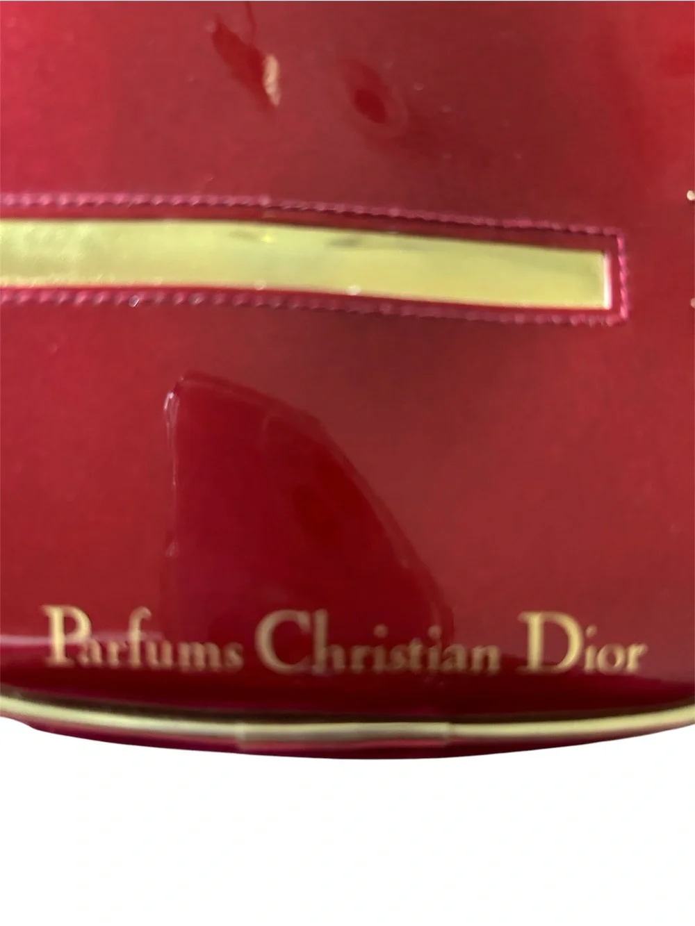 Dior Glossy Red Round Cosmetic Case with Gold Accents